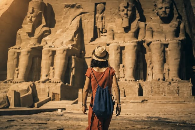 Abu Simbel rock-cut temple facade with colossal Ramesses statues
