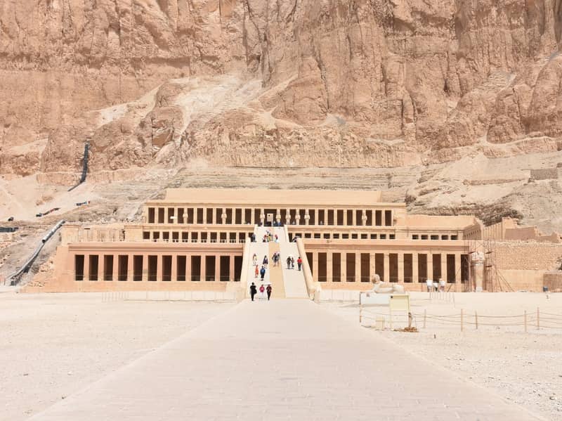 Visitors approaching the terraced Temple of Hatshepsut at Deir el-Bahari, Luxor