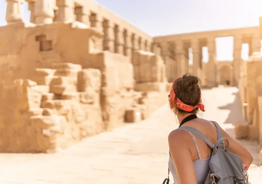 Visitor exploring the Temple of Karnak